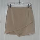 by the way. Revolve Nude Asymmetrical Mini Skirt Size Small  Photo 0