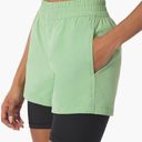 We Wore What  layered green black spandex running shorts Photo 0