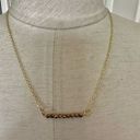 The Bar Gold tone copper bead necklace Photo 0