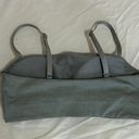 Nike Sportwear's Women's Logo Dri-Fit Femme Bandeau Sports Bra in Gray Photo 2