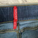 Spanx dark wash raw hem ankle skinny jean Photo 2