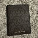 Michael Kors NWOT  passport wallet Photo 0