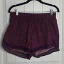 Athleta  printed mesh racer run shorts 4 inch inseams size medium running Photo 0