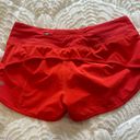 Lululemon Speed Up Mid-Rise Lined Short 4" in Red in size 6 Photo 1