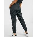 Nike  Belted Woven Track Jogger Pants in Black Swoosh Photo 3