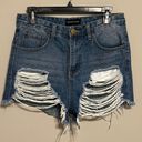 Pretty Little Thing  JEANIE MID WASH EXTREME RIPPED DENIM SHORTS Photo 1