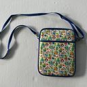 Disney  Parks Print Crossbody Skim Padded Bag Photo 0