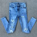 American Eagle AEO Super Hi Rise Jegging Size 2 Long Next Level Stretch distressed frayed jeans Photo 0