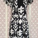 Tiana B  black and white knee length shift dress  with zipper collar detail

Size small Photo 1