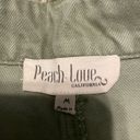 Peach Love California Green festival denim shorts Photo 1