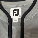 FootJoy FJ  Women’s sleeveless golf shirt with v-neck and tab collar Photo 2
