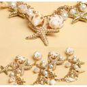 Jewelry by Lyra Beachy gold and white charm bracelet with starfish and seashells. NWT Photo 3