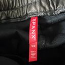 Spanx  Faux Vegan Leather Like Ankle Crop Mid Rise Jogger Pants Black Small Photo 1