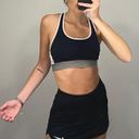 Calvin Klein / Revolve New Flex Motion Medium Impact Sports Bra in Black Color Block Photo 0