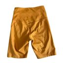 Girlfriend Collective  High-Rise Bike Short in Yellow/ Orange Size XS X-Small Photo 1