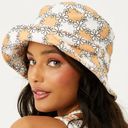 frankie's bikinis  - Jax Terry Daisy Bucket Hat in Orange and White Photo 3