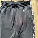 Nike women’s small  dri-fit black joggers with pockets Photo 2