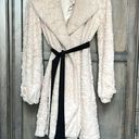 Hazel trench style coat. Cream furry material with black silky ribbon belt. Size L Photo 0