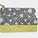 DKNY  Logo Wristlet Pouch Clutch Zipper Bag Daisies Saffron Leather Yellow Brown Photo 1