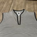 FootJoy FJ  Women’s sleeveless golf shirt with v-neck and tab collar Photo 1