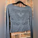 Y2K bedazzled long sleeve top with a heart and wings design Gray Photo 3