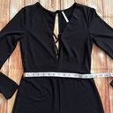 Mezzanine Women Long Sleeve Strappy V-Neck Shimmer Black Romper Size Medium Photo 5