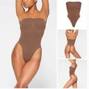 SKIMS NEW  Seamless Sculpt Strapless Thong Shapewear Bodysuit Brown L Photo 1