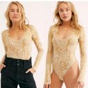 Free People  leopard print Bodysuit Sz M Photo 1