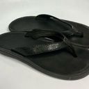 Olukai  black flip flops women’s size 7 Photo 0