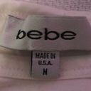 Bebe  EUC fitted short sleeve top Photo 3