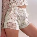 American Eagle  High Rise Floral Crinkle Patchwork Eyelet Shorts Size Medium Photo 0