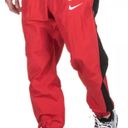 Nike Sportswear Windbreaker Pants Joggers Red Photo 0