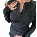 Athleta  Sports Top Black Body Hugging Long Sleeve Many Pockets & Thumb Holes Photo 1