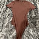 Naked Wardrobe Bodysuit Photo 0