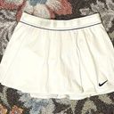 Nike  Womens DRI-FIT Skort Mini Skirt Sporty Preppy White Black Swoosh Photo 0