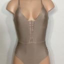 PilyQ New.  sandstone tan one piece. $149 Photo 0