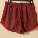 Nike Womens  Dri-Fit Red Maroon Lined Running Shorts Size Medium 3” Inseam Photo 1