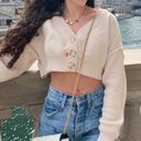 Urban Outfitters , BDG cream cropped cardigan Photo 1