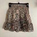 Revolve Smocked Tiered Ruffle printed wrap mini skirt Photo 9