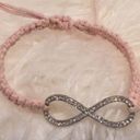 infinity  Pull String Pink Bracelet Photo 0