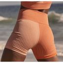 Free People  Movement Orange Happiness Runs Striped Rib Colorblock Bike Shorts Photo 4