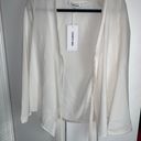 Elizabeth and James White Cardigan Photo 0