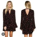 Free People Tegan mini dress black and red floral long sleeve with front and back cut out  Photo 1