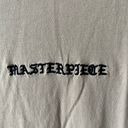 Passports Nude tan embroidered t-shirt “ Masterpiece “ Passport brand S Photo 1