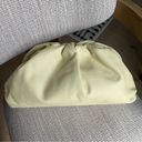 Bottega Veneta  The Pouch Leather Bag in Light Yellow Photo 4