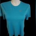 Nike  size small dry fit turquoise topbust 36 inches length 25 “short sleeve Photo 1