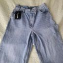 Pretty Little Thing  NEW Light Blue Wash Asymmetric Waistband Baggy Low Rise, Size 4 Photo 2