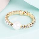 Boutique Rhinestone Pearl Detail Gold Band Stretchy Ring Photo 1