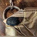 Chateau  | ladies metallic gold wristlet. Photo 4