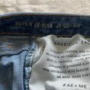 American Eagle -HIGH RISE JEGGING-SIZE 2R High rise jegging blue jeans, has stretch, size 2R, excellent condition  Measurements: Waist: side to side 14 inches  Rise: 9 inches  Inseam: 26 1/2 inches Photo 8